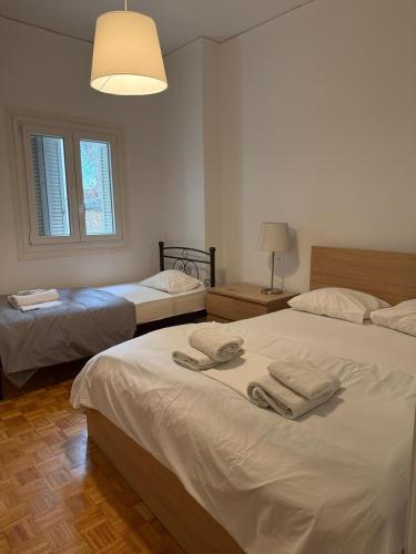 Spacious Two-Bedroom Apartment, Short Walk to Neos Kosmos Metro Station