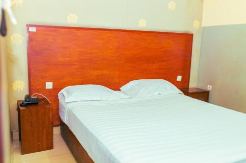 Llit o llits en una habitació de Saphir hotel
