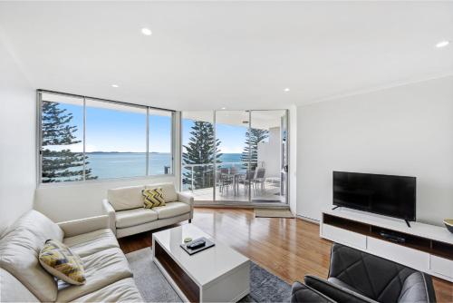 Μια τηλεόραση ή/και κέντρο ψυχαγωγίας στο Sandcastle Apartments