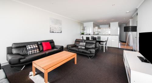 Η κουζίνα ή μικρή κουζίνα στο Sandcastle Apartments