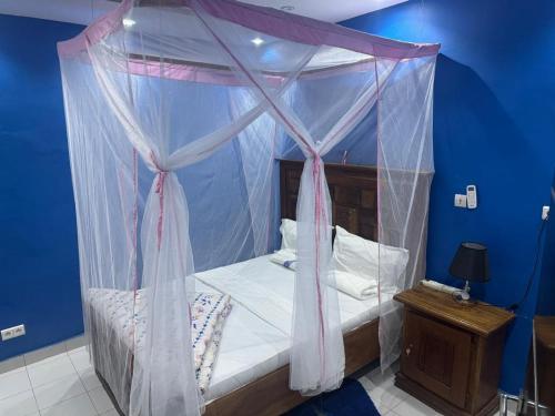 Vuode tai vuoteita majoituspaikassa STUDIO A Mbour