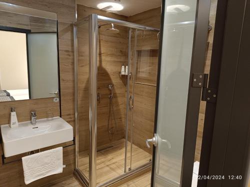 a bathroom with a shower and a sink at Sultanahmet Newport Hotel in Istanbul