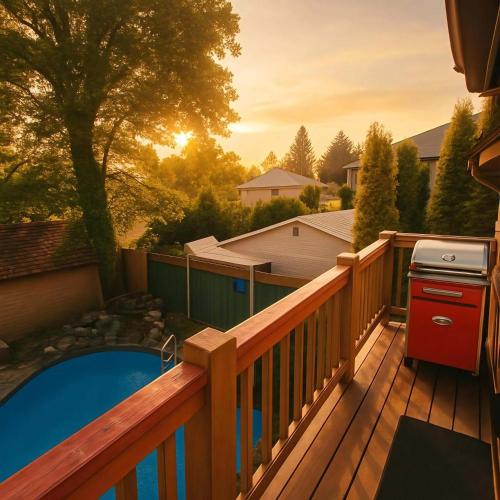 a deck with a hot tub and a grill at Charming "Melrose Place" w Year-Round Heated Pool, Deck & Grill in Victoria