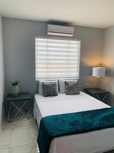 Llit o llits en una habitació de Xevize Apartment 3