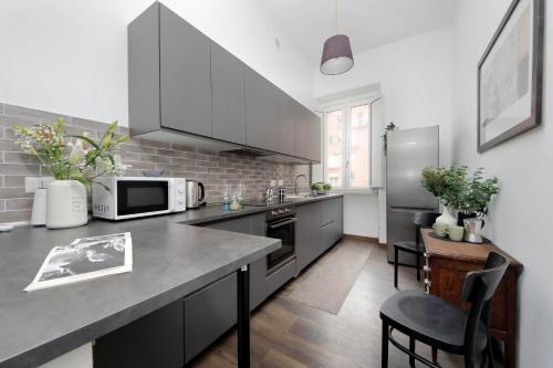 Foto Scipioni Spacious Apartment 2