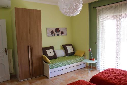Postel nebo postele na pokoji v ubytování Il Roseto di Daniela