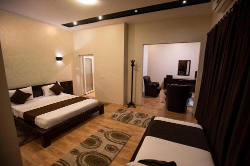 Llit o llits en una habitació de Hotel XXL