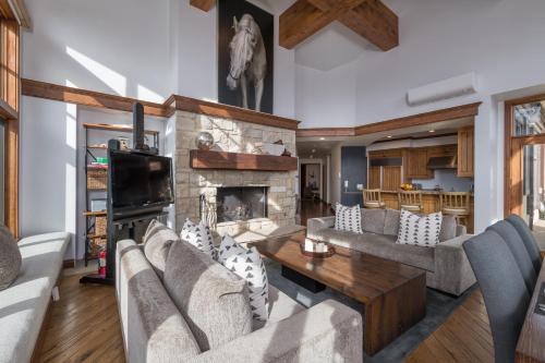 a living room with a couch and a fireplace at Colonnade Residence 11 in Ketchum