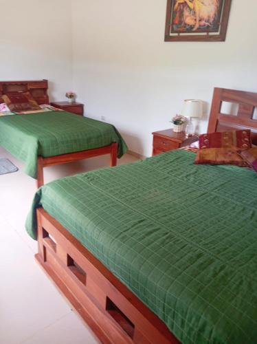 Llit o llits en una habitació de Looking Samaipata