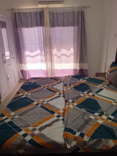 Llit o llits en una habitació de SAL 106 bloc 3A