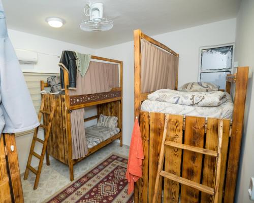 Llit o llits en una habitació de Hakaia Community