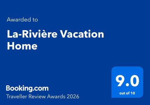 a blue sign that saysiane refugee vacation home at La-Rivière Vacation Home in Lal-lo