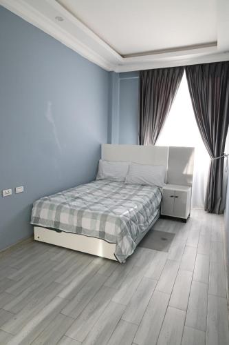 Llit o llits en una habitació de Feels like home