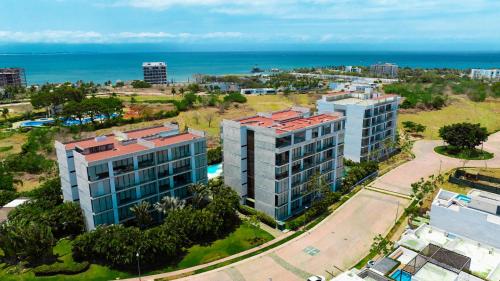 an aerial view of a building and the ocean at Torres Mittah Oceanview Condos at La Cruz de Huanacaxtle in Cruz de Huanacaxtle