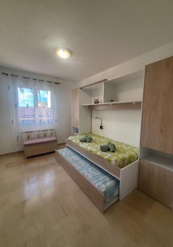 a bedroom with a large bed in a room at ElFogaril in Teruel
