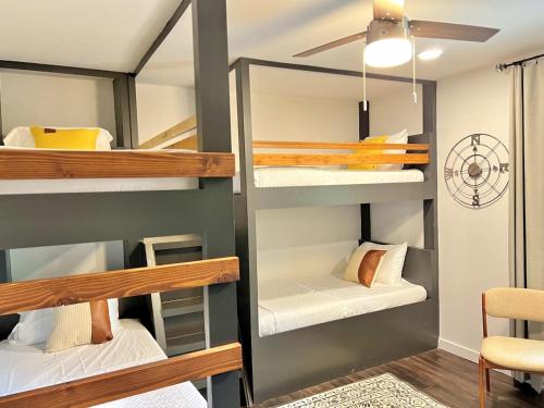 a small room with bunk beds in it at HPThe Abode Downtown Bojangles Dogs Welcome Yard in Charlotte
