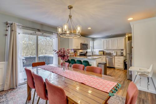 a kitchen and dining room with a table and chairs at Family Retreat with Game Room, 4 Mi to Kalahari! in Emerald Lakes