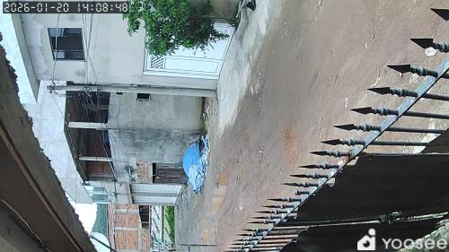 an overhead view of an alley with a building at Casa de adao in Guarujá
