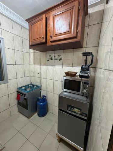 Majoituspaikan Bhome keittiö tai keittotila