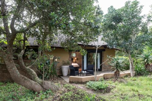 Jardín al aire libre en Kariega Game Reserve River Lodge