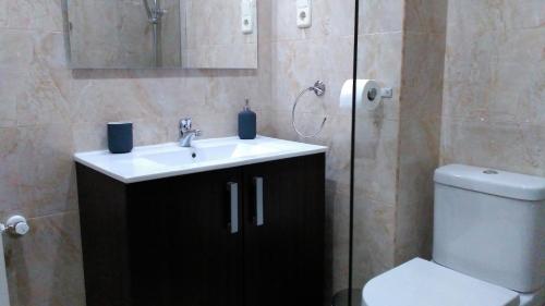 Ett badrum på Madrid Rent 3