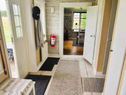 a hallway with a fire hydrant in a house at 4 star holiday home in ÖDESHÖG in Ödeshög