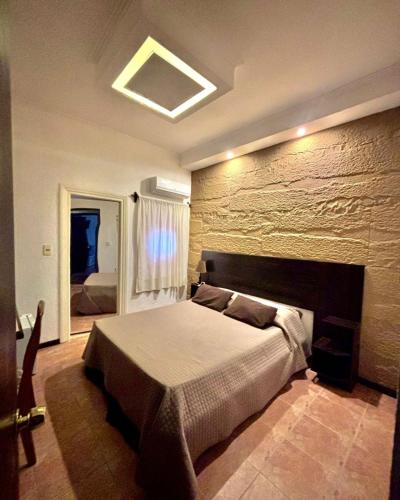 Kama o mga kama sa kuwarto sa Hotel Select