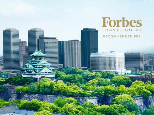 a view of a city skyline with tall buildings at Hotel New Otani Osaka in Osaka