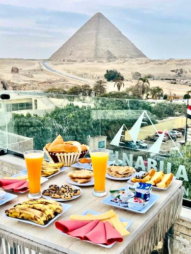 al nabila pyramids inn