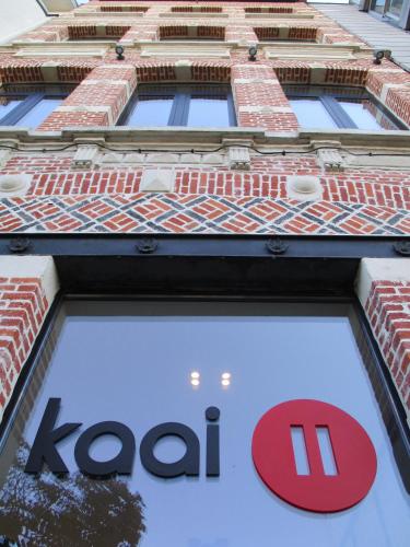 a koreanoreanoreanoreanorean company koci logo is shown above a store at Kaai11 - Riverview Lofts & Suites in Antwerp
