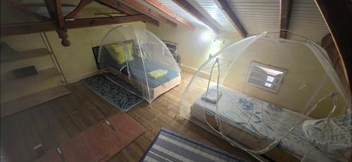 an overhead view of a room in a house at Au cœur de douenel bouillante cheques vacances acceptées in Bouillante