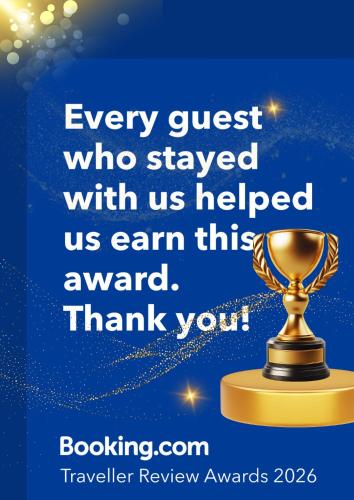 a picture of a gold trophy on a blue background at Hotel Emiru 敷地内駐車場2台 in Osaka