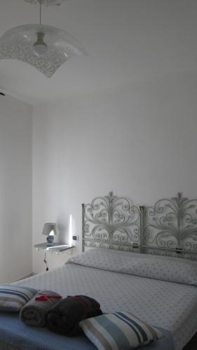 Letto o letti in una camera di B&B Agorà Sarzana