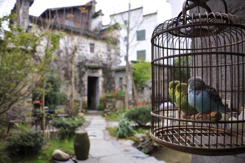 ブ源県にあるWuYuan QiYe YanXiang Guesthouseのギャラリーの写真