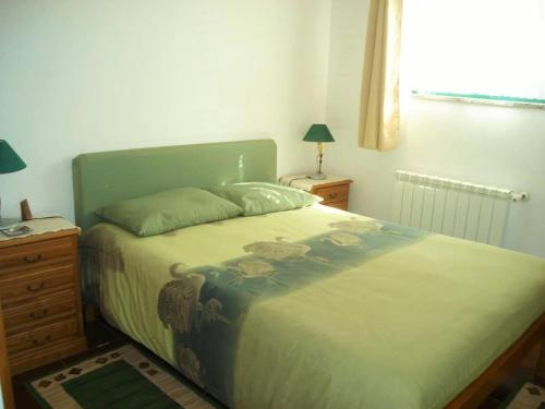 Кровать или кровати в номере Casa da Benda