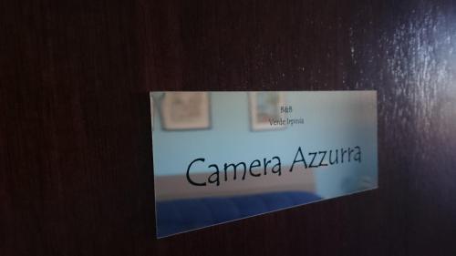 a sign on a door with the words camparia auvino at B&B Verde Irpinia in Gesualdo