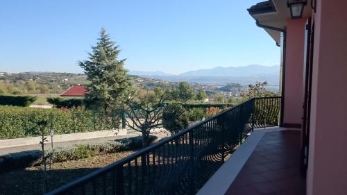 a balcony of a house with a view at B&B Verde Irpinia in Gesualdo