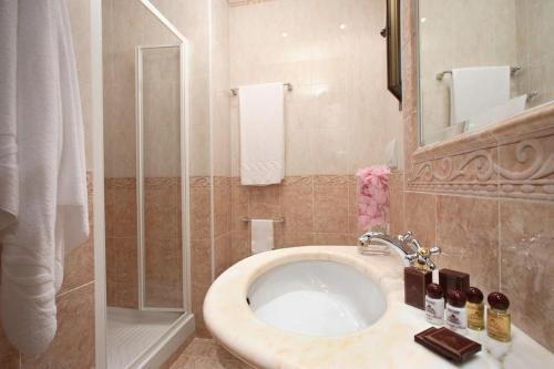 Koupelna v ubytování Hotel Eliseo