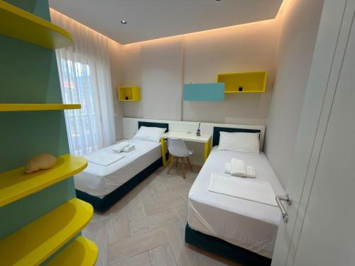 Кровать или кровати в номере Onis Apartment