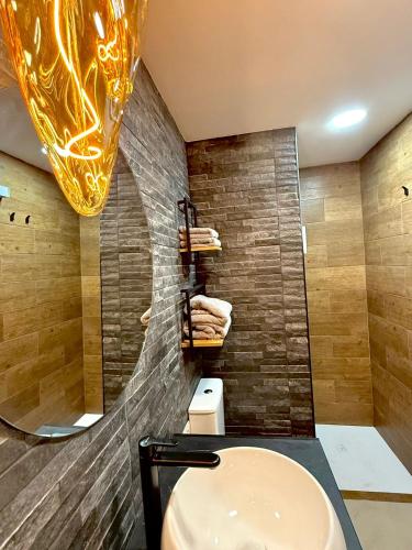 a bathroom with a sink and a shower at Candela 2 en candelaria in Candelaria