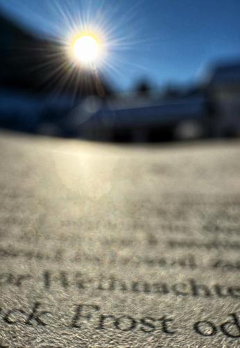 a close up of the sun shining on the sand at Haus Luise in Bad Hindelang