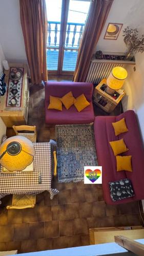an overhead view of a living room with a purple couch at Facing the Sestriere Ski Slopes in Borgata Sestriere