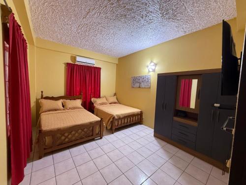 Llit o llits en una habitació de Jaycees Place