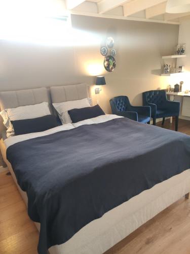 En eller flere senge i et værelse på B&B Hoofddorp