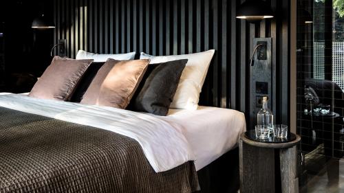 Una cama o camas en una habitación de Mauritzhof Hotel Münster