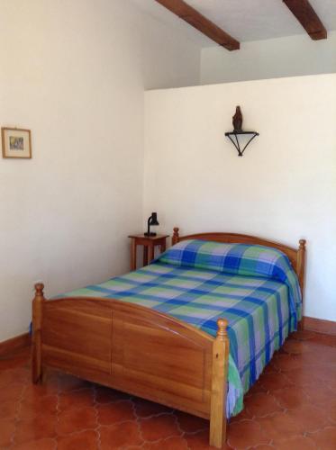 Postel nebo postele na pokoji v ubytování La Casa de Cafe Bed and Breakfast