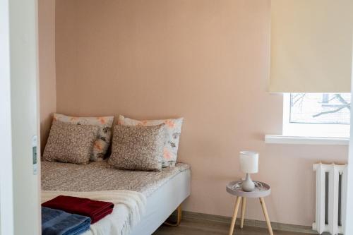 Llit o llits en una habitació de Aia apartment