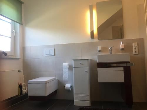 Ένα μπάνιο στο H&E Apartments