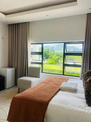 Llit o llits en una habitació de Tranquil Ridge BnB