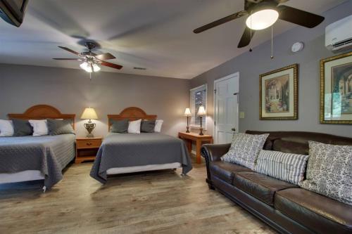 a living room with two beds and a couch at Rivers Edge 703 in Helen